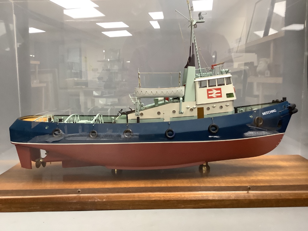 A scale model of the British Railways tug 'Meeching' (Newhaven) and another smaller model of a tug